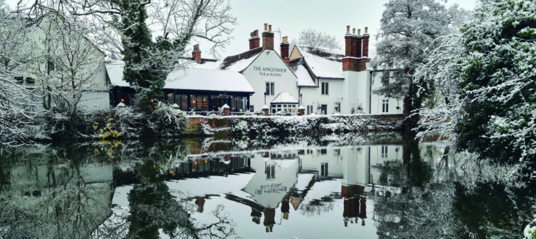 View of The Kingfisher Pub with Rooms in the snow